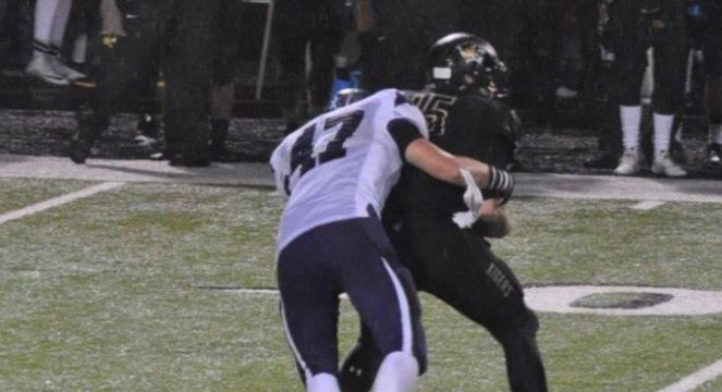 Eli gets the tackle against Bentonville