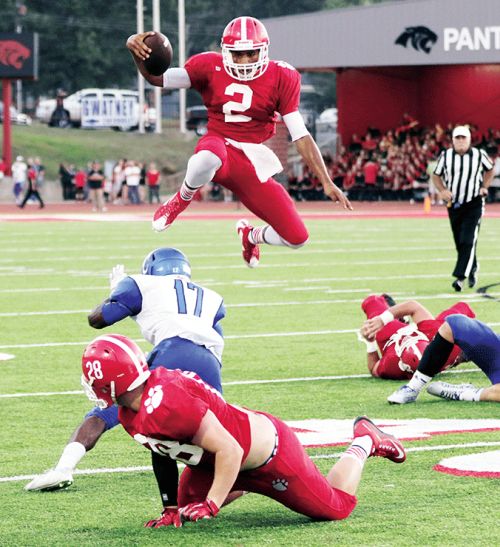 Jarrod Barnes leaps over defender