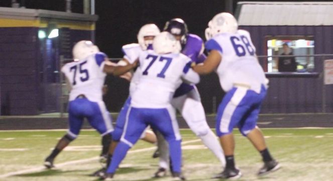 Four players block Langston